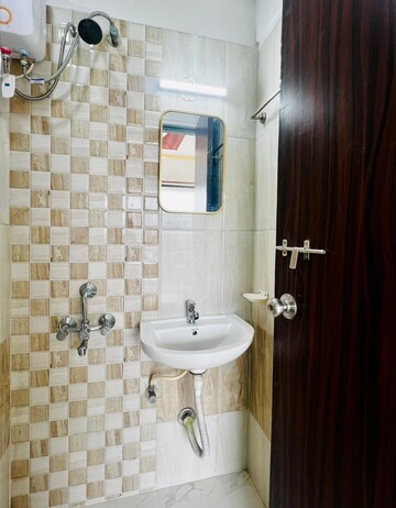 Bathroom in 1 BHK Apartment at Man Opus, Mira Road – for Sale