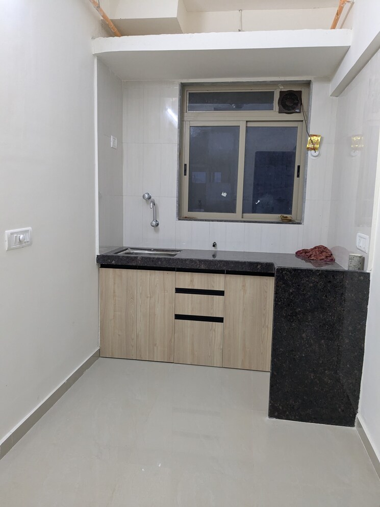 Kitchen, satellite-garden 1 Bedroom 310 Sq.Ft. Apartment In Goregaon East Mumbai 8877650
