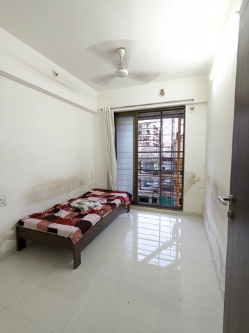 Bedroom in 2 BHK Apartment at Acme Avenue, Kandivali West – for Rent