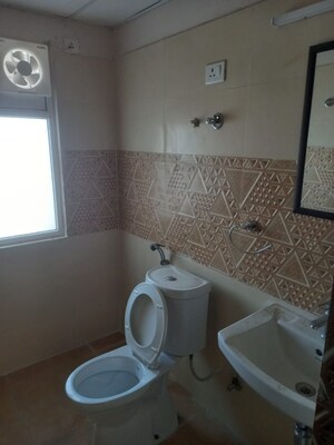 Bathroom in 2.5 BHK Apartment at Amrapali Golf Homes, Sector 4 Greater Noida – for Sale
