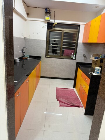 Kitchen in 2 BHK Apartment at Acme Ozone, Manpada – for Rent