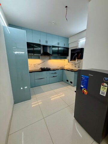Kitchen in 2 BHK Apartment at Aparna Sarovar Zicon, Nallagandla – for Rent