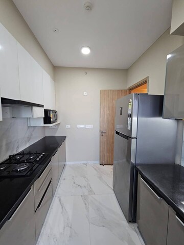 Kitchen in 2 BHK Apartment at Shapoorji Pallonji Joyville Phase 2, Sector 102 – for Sale