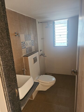 Bathroom in 2 BHK Apartment at Jangid Galaxy, Ghodbunder Road – for Sale