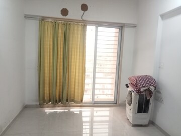 Living Room in 1 BHK Apartment at Salasar Woods, Mira Road – for Rent