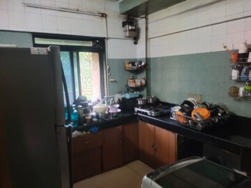Kitchen in 2 BHK Apartment at Gokul Avenue Apartment, Kandivali East – for Sale