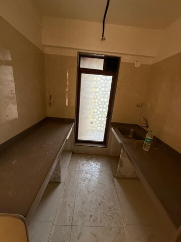 Kitchen in 3 BHK Apartment at Diamond Garden, Chembur – for Sale