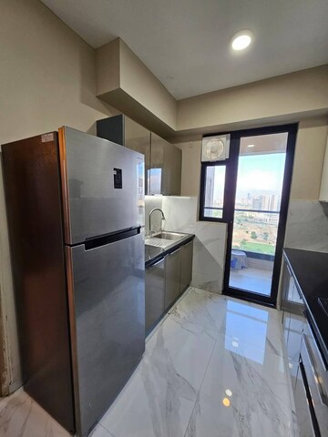 Kitchen in 2 BHK Apartment at Shapoorji Pallonji Joyville Phase 2, Sector 102 – for Rent