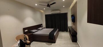 Living Room in Studio Apartment at Gaur City Mall, Sector 4 Greater Noida – for Rent