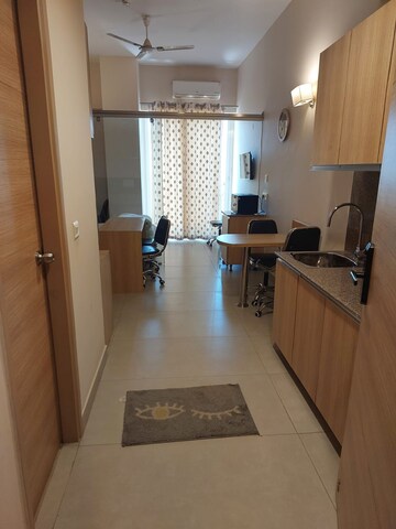 Living Room in Studio Apartment at Gaur City Mall, Sector 4 Greater Noida – for Rent