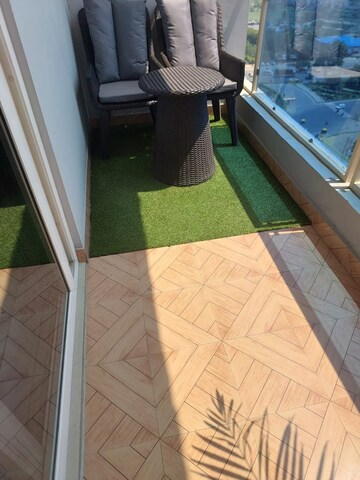 Balcony in Studio Apartment at Gaur City Mall, Sector 4 Greater Noida – for Rent