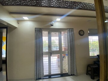 Living Room in 2 BHK Apartment at Chintamani Pushkardeep, Warje – for Rent