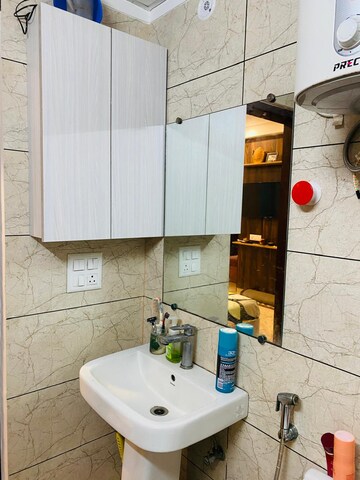 Bathroom in 3.5 BHK Apartment at Gulshan Ikebana, Sector 143 – for Sale