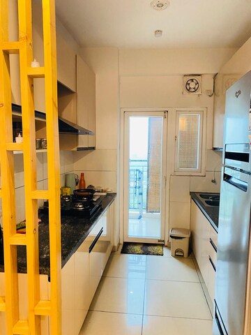 Kitchen in 3.5 BHK Apartment at Gulshan Ikebana, Sector 143 – for Sale