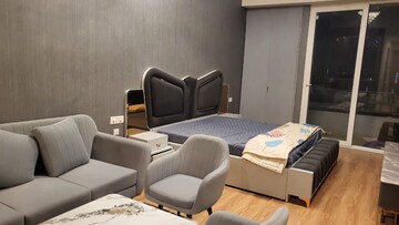 Living Room in Studio Apartment at Gaur City Mall, Sector 4 Greater Noida – for Rent
