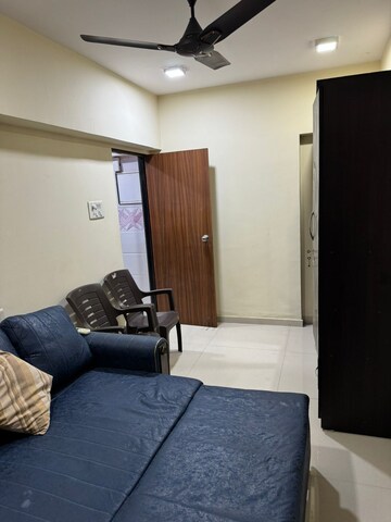 Living Room in 2 BHK Apartment at Shri Balaji Ashirwad, Malad West – for Rent
