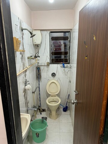 Bathroom in 2 BHK Apartment at Shri Balaji Ashirwad, Malad West – for Rent