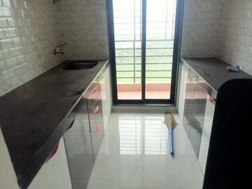 Kitchen in 2 BHK Apartment at Shree Ostwal Horizon, Mira Road – for Rent