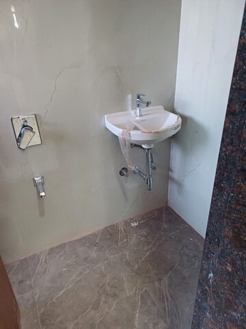 Bathroom in 2 BHK Apartment at Tharwani Meghna Montana, Ambernath West – for Rent