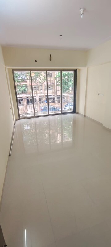 Room in 2 BHK Apartment at Madina Towers CHS, Goregaon West – for Rent