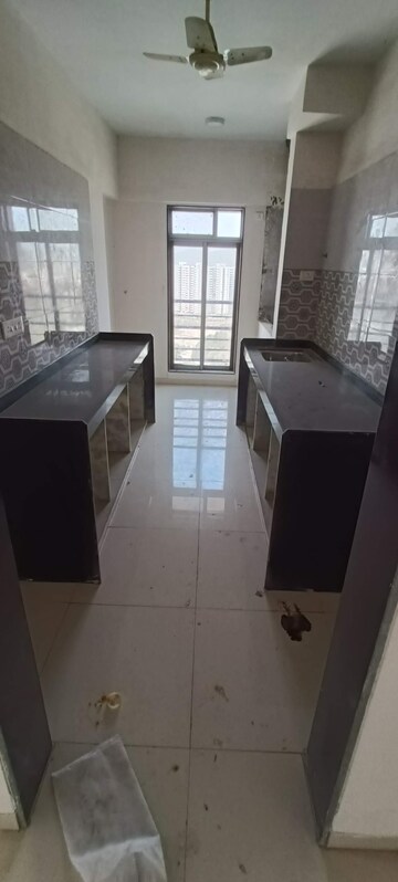 Kitchen in 2 BHK Apartment at Amisha Empire, Mira Road – for Rent