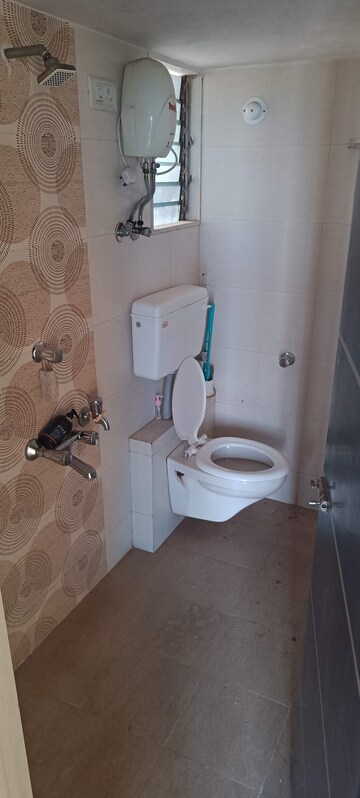 Bathroom in 2 BHK Apartment at Amisha Empire, Mira Road – for Rent