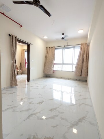 Living Room in 1 BHK Apartment at Dotom Isle, Malad West – for Rent