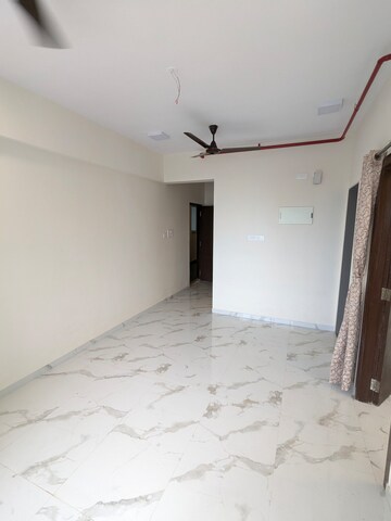 Living Room in 1 BHK Apartment at Dotom Isle, Malad West – for Rent