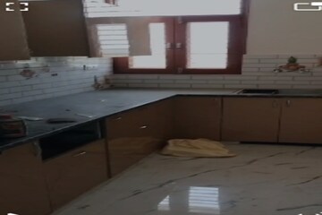 Kitchen in 2 BHK Apartment at Raj Nagar Extension – for Sale