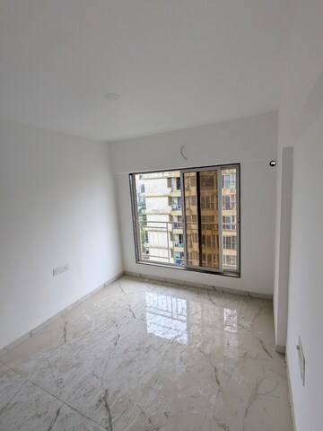 Bedroom in 1 BHK Apartment at Dharti Presidio, Malad West – for Rent
