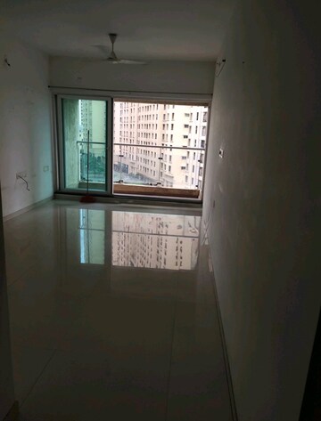 Living Room in 2 BHK Apartment at Rustomjee Urbania Azziano, Thane West – for Rent