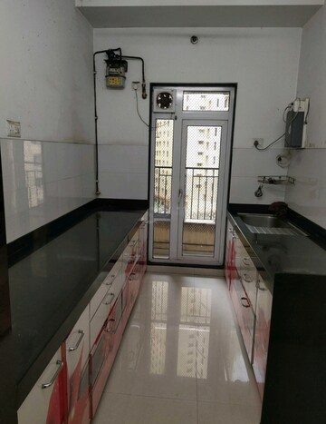 Kitchen in 2 BHK Apartment at Rustomjee Urbania Azziano, Thane West – for Rent