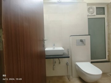 Bathroom in 1 BHK Apartment at Omkar Signet, Malad East – for Rent