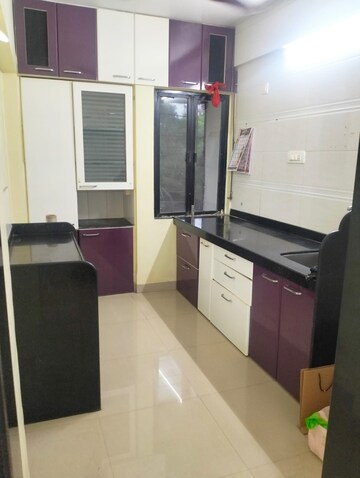 Kitchen in 2 BHK Apartment at Arjun CHS Vasant Vihar, Vasant Vihar – for Sale