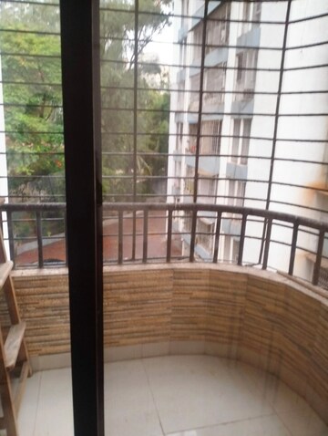Balcony in 2 BHK Apartment at Arjun CHS Vasant Vihar, Vasant Vihar – for Sale