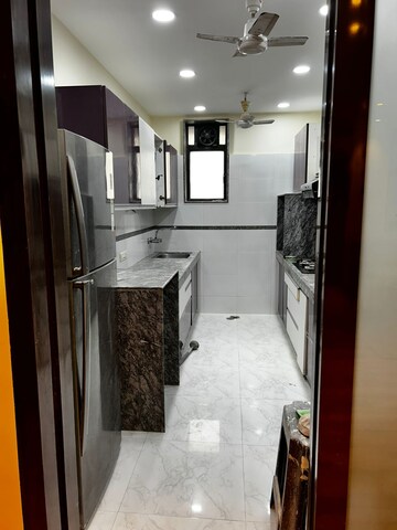 Kitchen in 3 BHK Apartment at Anandashram CHS Girgaon, Girgaon – for Rent