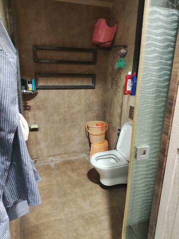 Bathroom in 3 BHK Apartment at Vesu – for Sale