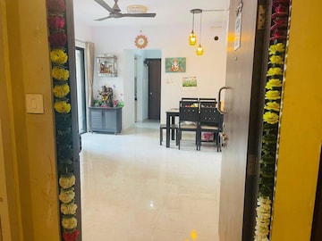Living Room in 1 BHK Apartment at Lodha Palava Downtown, Dombivli East – for Rent