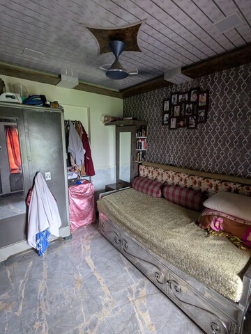 Bedroom in 1 BHK Apartment at Nakshatra Heights, Kandivali West – for Rent