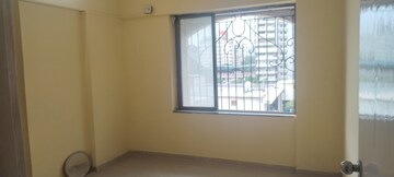 Bedroom in 2 BHK Apartment at Laxmi Royal Classic, Mulund West – for Rent