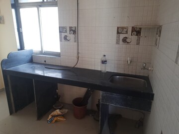 Kitchen in 1 BHK Apartment at Shiv Om CHS, Naupada – for Rent