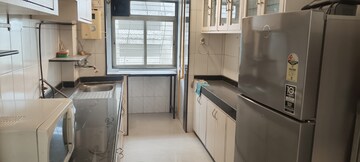 Kitchen in 2 BHK Apartment at Nirmal Lifestyle Residency CHS Ltd, Mulund West – for Sale
