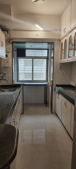Kitchen in 2 BHK Apartment at Nirmal Lifestyle Residency CHS Ltd, Mulund West – for Sale