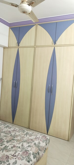 Bedroom in 2 BHK Apartment at Nirmal Lifestyle Residency CHS Ltd, Mulund West – for Sale