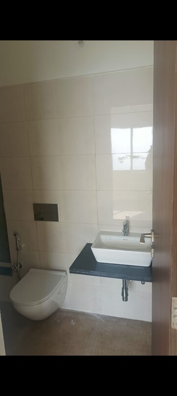 Bathroom in 1 BHK Apartment at Omkar Signet, Malad East – for Rent