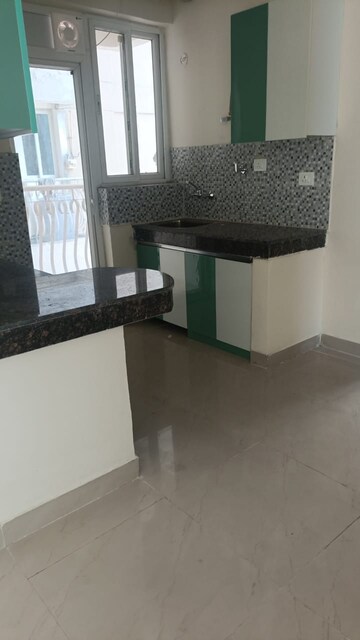 Kitchen in 2 BHK Apartment at Sikka Karnam Greens, Sector 143b – for Rent