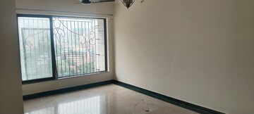 Living Room in 2 BHK Apartment at Laxmi Royal Classic, Mulund West – for Rent