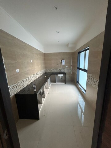 Kitchen in 3 BHK Apartment at Rajesh Raj Infinia, Malad West – for Rent