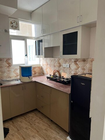 Kitchen in 2 BHK Apartment at Amrapali Riverview, Amrapali Leisure Valley – for Rent