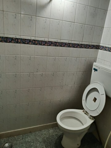 Bathroom in 1 BHK Apartment at K Raheja Palm Court, Malad West – for Rent